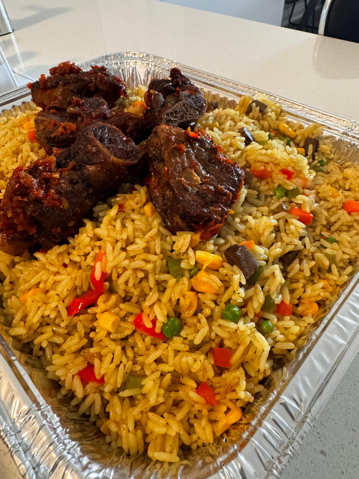 Fried rice with beef in a foil tray