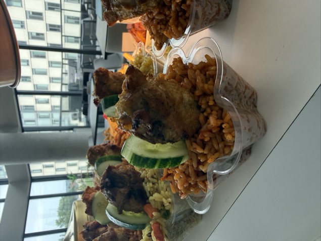 Jollof rice with fried chicken close-up