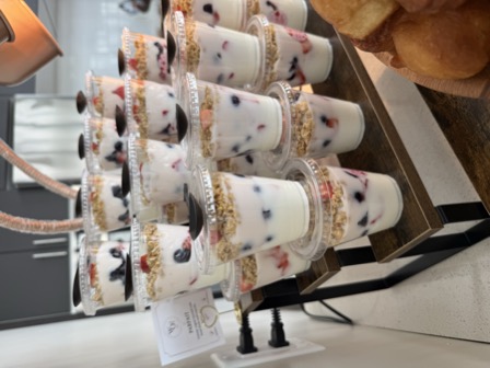 Close-up of yogurt parfait cups with berries and granola